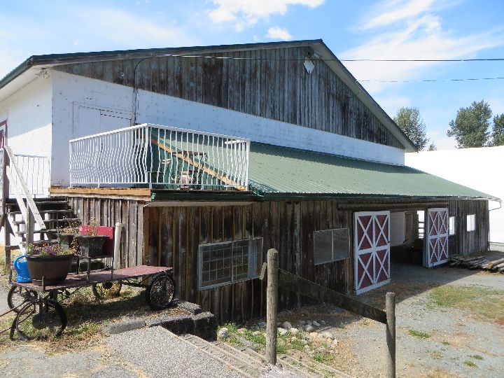 The barn on a beautiful day.
